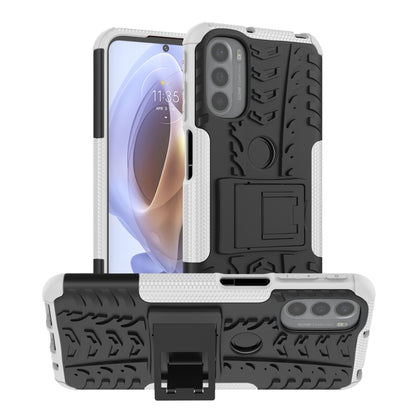 Rugged white phone case with tire tread texture and built-in kickstand holder