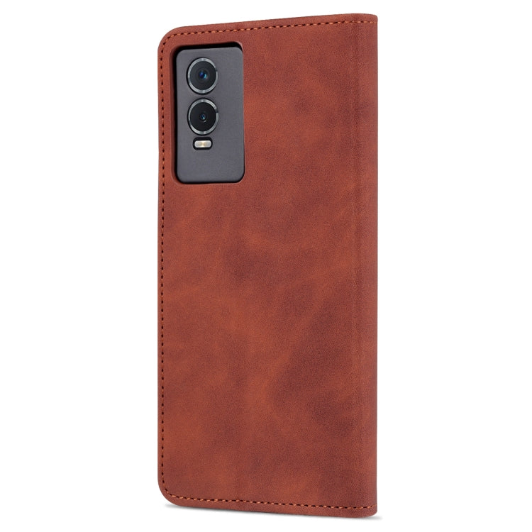 Brown textured leather phone case with camera cutout and contrast stitching