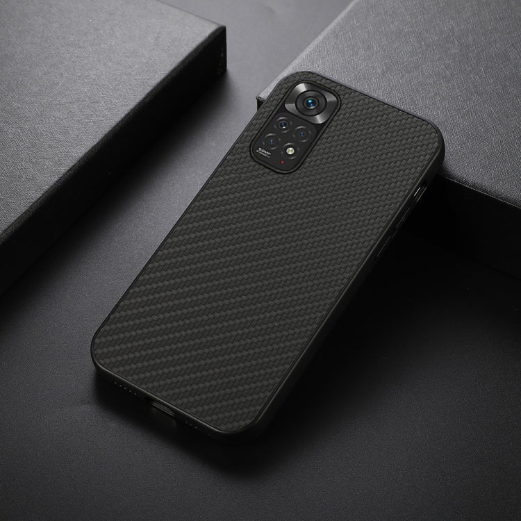 Black carbon fiber texture phone case with camera cutout and protective edges