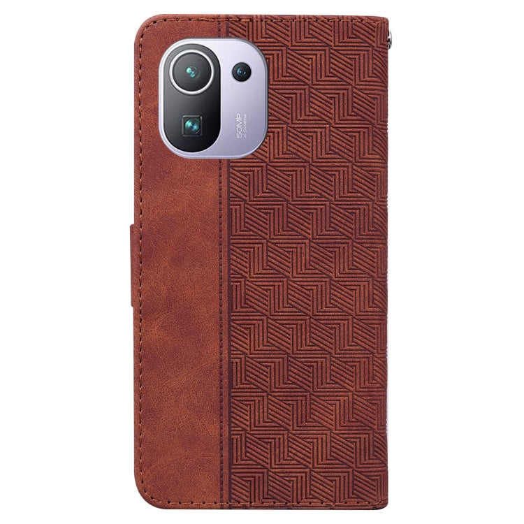 Brown geometric embossed leather phone case with camera cutout and vertical pocket