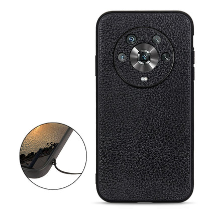 Black genuine leather phone case with circular camera cutout and textured finish.