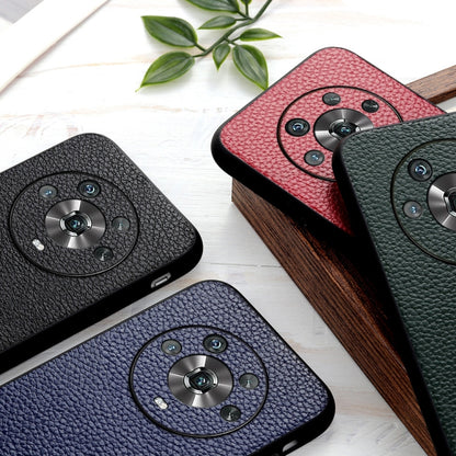 Set of four genuine leather phone cases in black, red, blue, and green with camera cutouts.