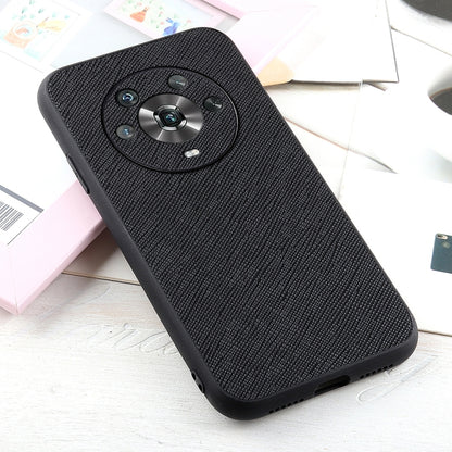 Black genuine leather phone case with textured finish and circular camera ring