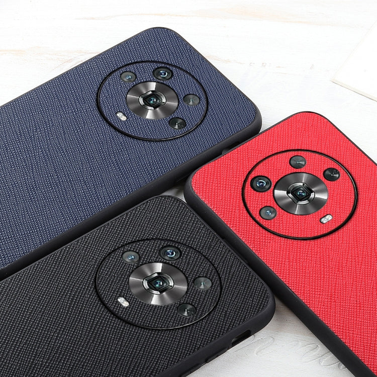 Blue, red, and black leather phone cases with circular camera emblems