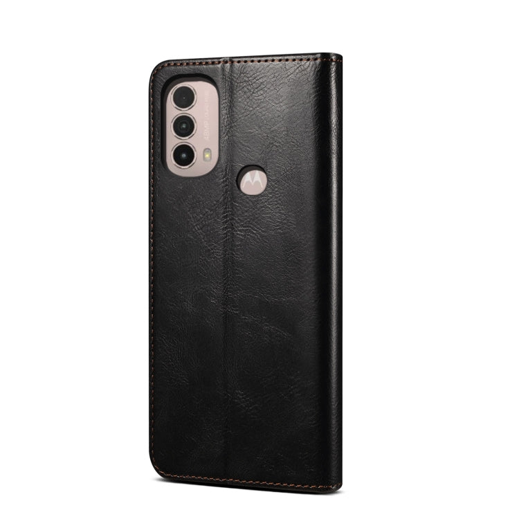 Black crazy horse leather phone case back with dual camera cutouts and logo badge