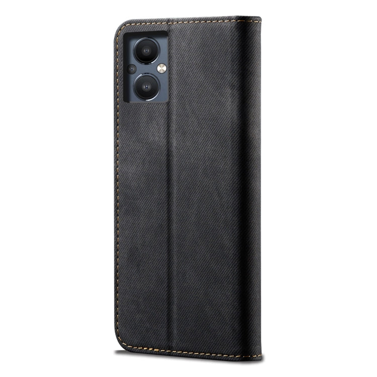 Black denim-texture flip leather phone case, back view with camera cutouts