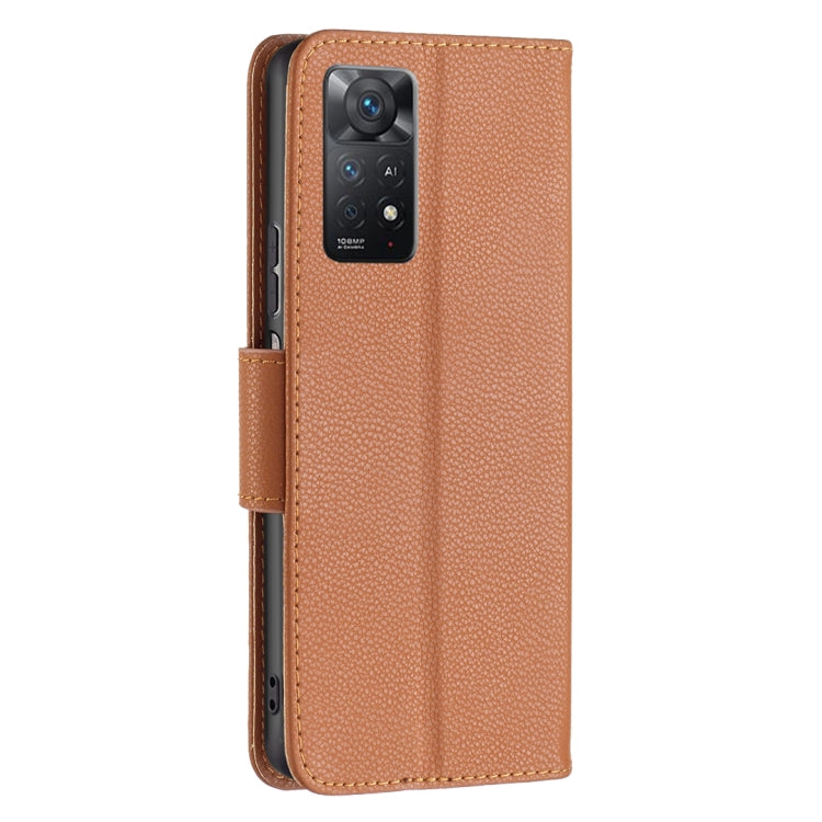 Brown textured leather vertical flip phone case with camera cutout and strap