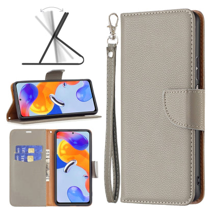 Grey textured leather horizontal flip phone case with front flap and wrist strap