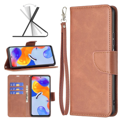 Brown leather flip phone case with wrist strap and front card pocket