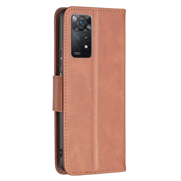 Brown leather flip phone case with camera cutout and front card pocket