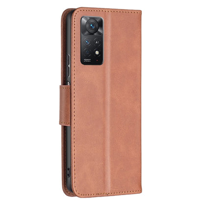 Brown leather flip phone case with camera cutout and front card pocket