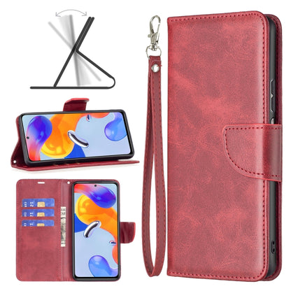 Red leather flip phone case with wrist strap and front card pocket