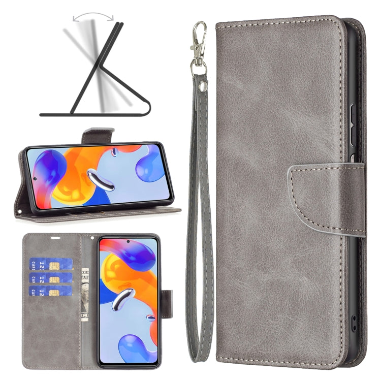 Grey leather flip phone case with wrist strap and front card pocket
