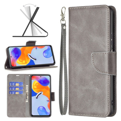 Grey leather flip phone case with wrist strap and front card pocket