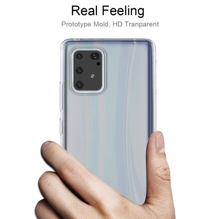 Transparent TPU phone case held in hand, showing rear camera cutout
