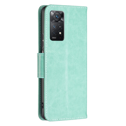 Mint green embossed leather phone case with camera cutout and side button openings