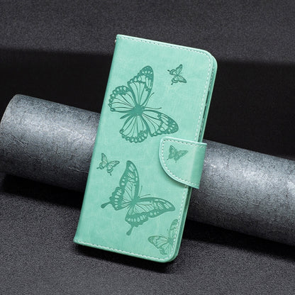 Mint green embossed butterfly leather folio phone case with matching flap and strap