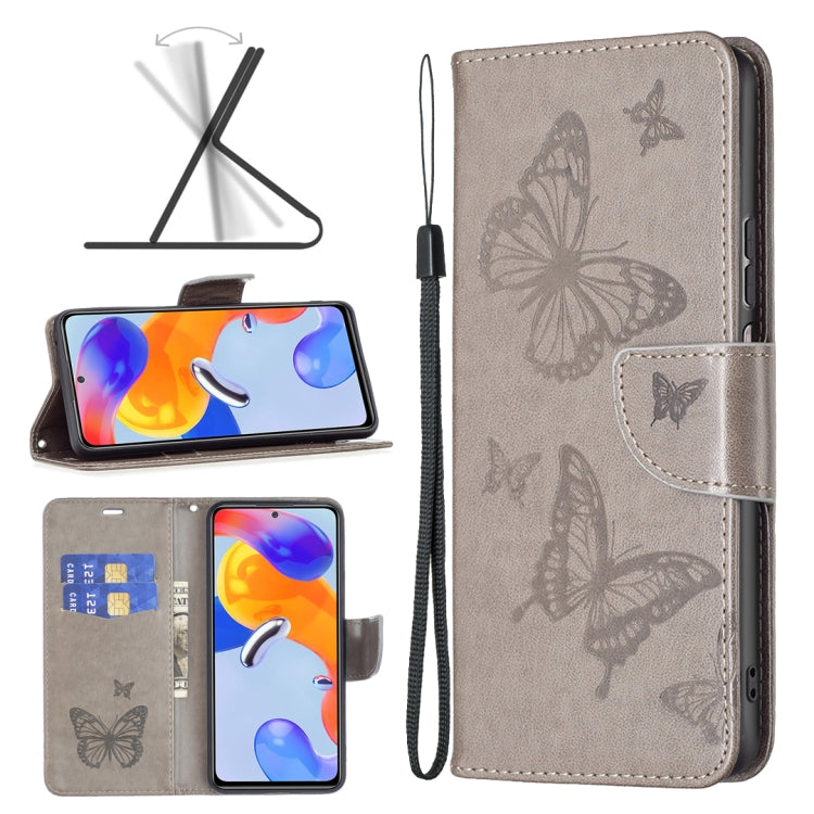 Grey embossed butterfly leather wallet phone case with folio flap and wrist strap