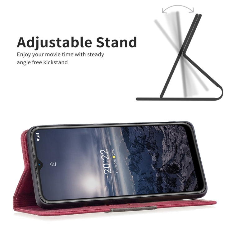 Red leather phone case with flip cover and built-in adjustable stand for viewing.