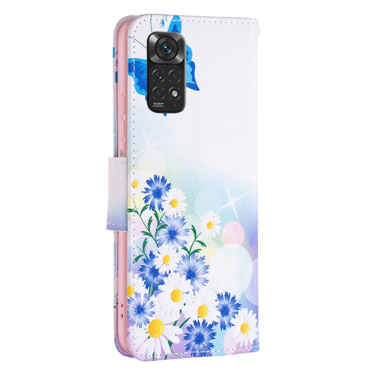 Flip leather phone case for Redmi Note 11 with blue butterfly and floral print, camera cutout