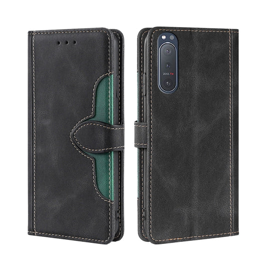 Black leather phone wallet case with magnetic buckle, green accent, front and back view