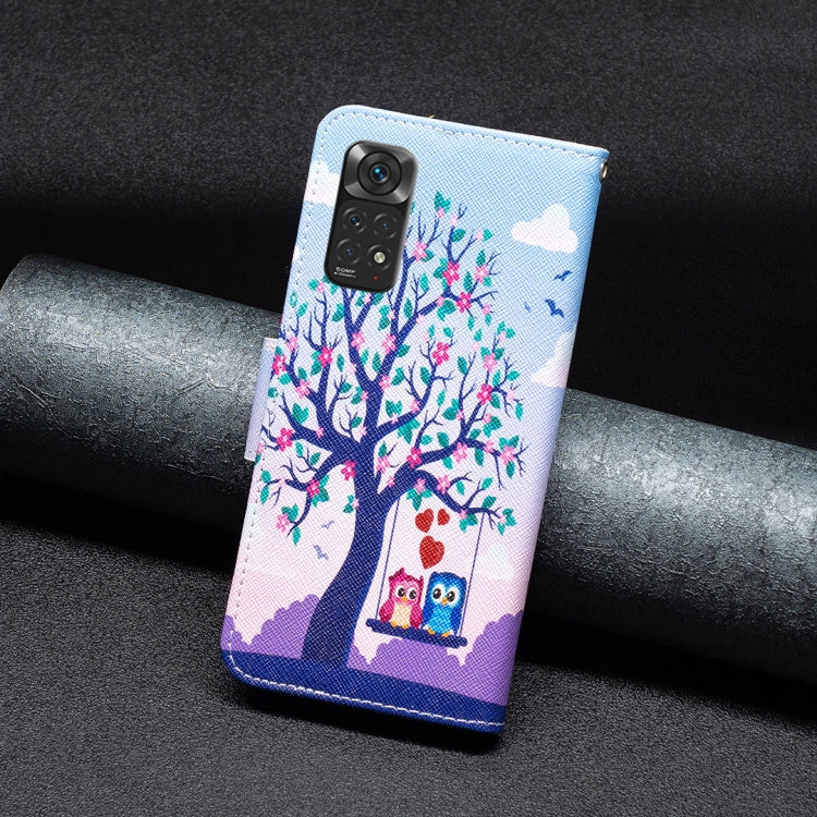 Light blue phone case with tree and owl print; faux leather flip cover with camera window