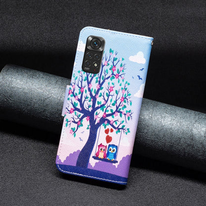 Light blue phone case with tree and owl print; faux leather flip cover with camera window