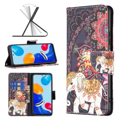 Wallet-style leather phone case with red and dark floral print and white elephant illustration