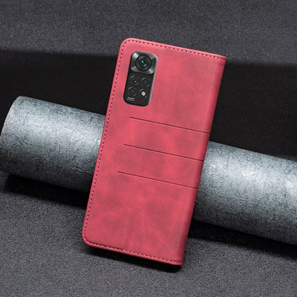 Red leather folio phone case with camera opening, horizontal seam lines, back view