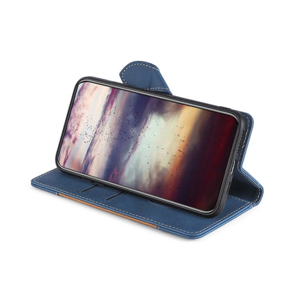 Blue leather flip phone case with magnetic buckle, front cover open and phone exposed