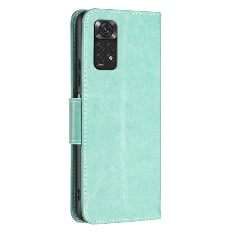 Mint green leather-style phone case with camera cutout and side button openings
