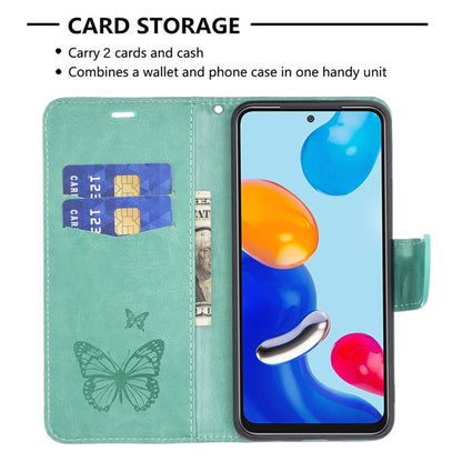 Mint green flip phone case with 2 card slots, butterfly pattern, and wrist strap