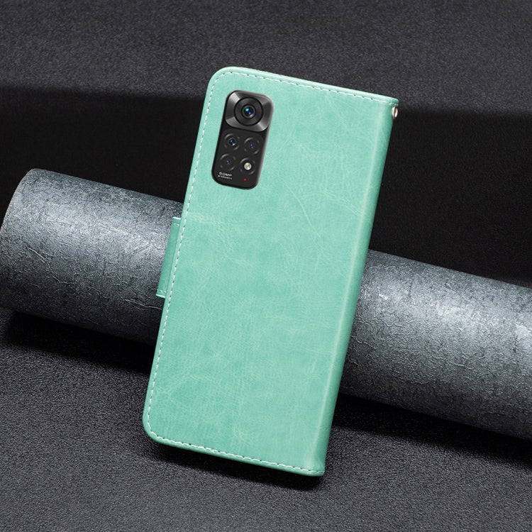 Mint green leather-style phone case with camera cutout and stitched flip edge