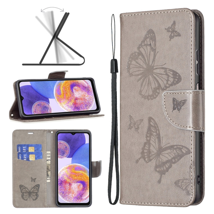 Two-butterfly embossed leather phone case with flip cover and wrist strap, taupe