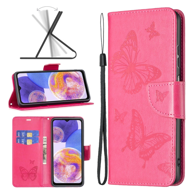 Two-butterfly embossed leather phone case with flip cover and wrist strap, pink
