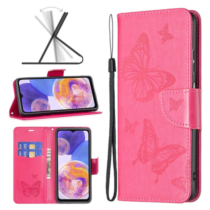 Two-butterfly embossed leather phone case with flip cover and wrist strap, pink