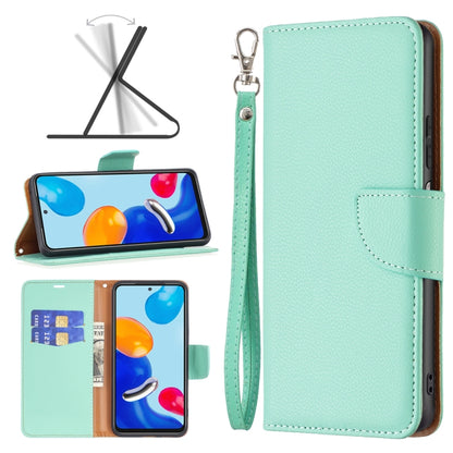 Mint textured leather phone folio case with wrist strap and front card holder.
