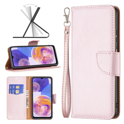 Light pink textured leather phone folio case with wrist strap and card slot.