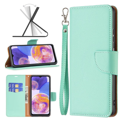 Light mint textured leather phone folio case with wrist strap and card slot.