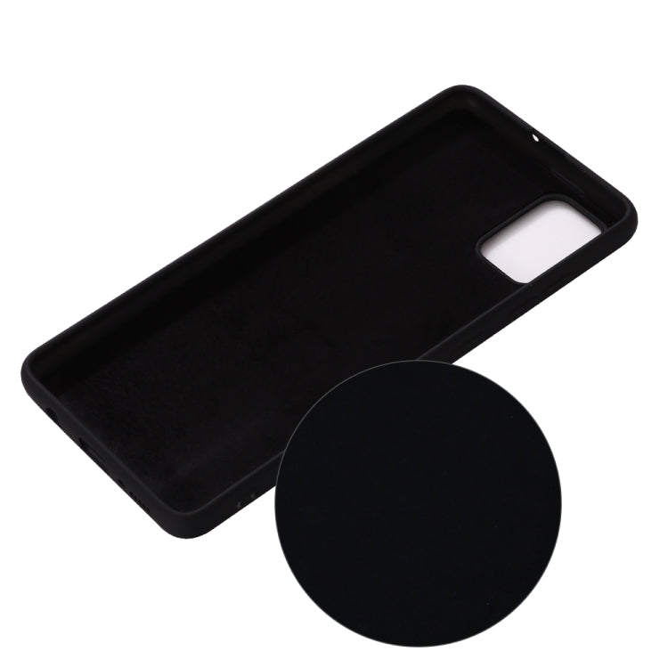 Liquid silicone phone case with camera and button openings (black).