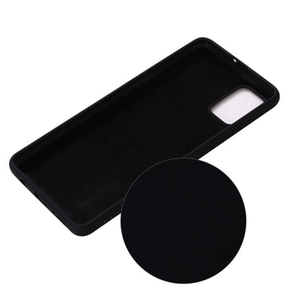 Liquid silicone phone case with camera and button openings (black).