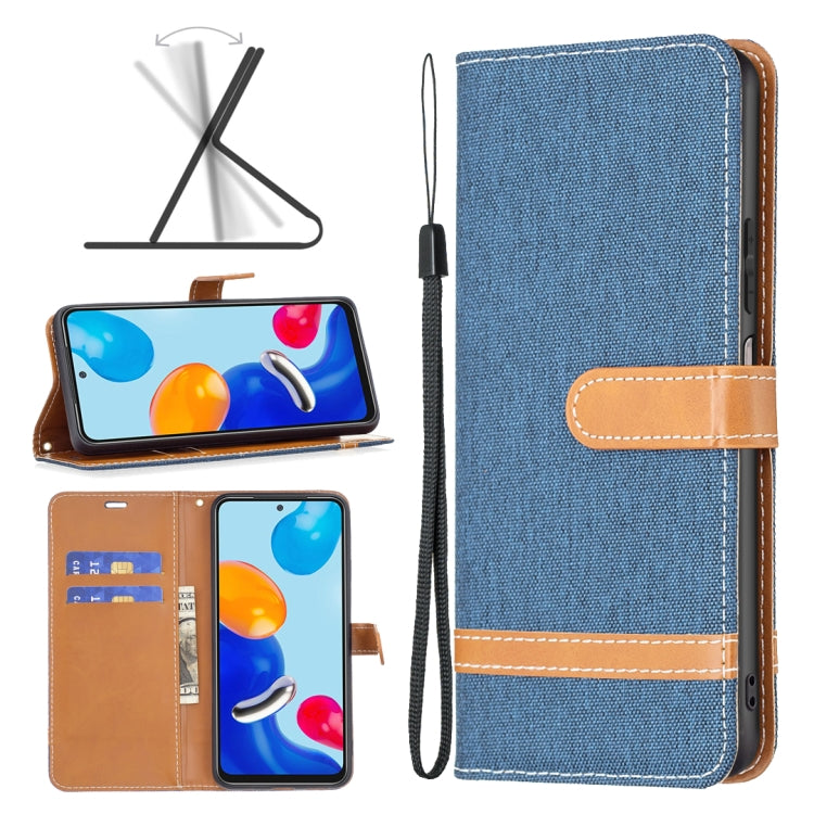 Blue fabric wallet phone case with tan card slot and wrist strap, textured cover panel