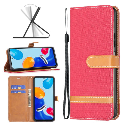 Rose red fabric wallet phone case with tan card holder and wrist strap, textured cover