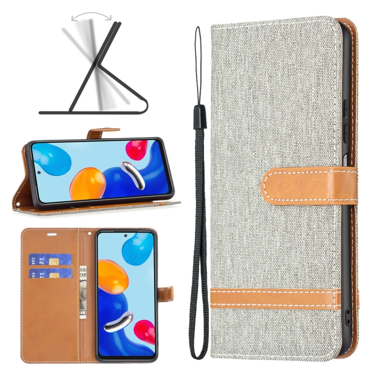 Fabric phone case with tan leather accents and wrist strap, front slot and stitched details