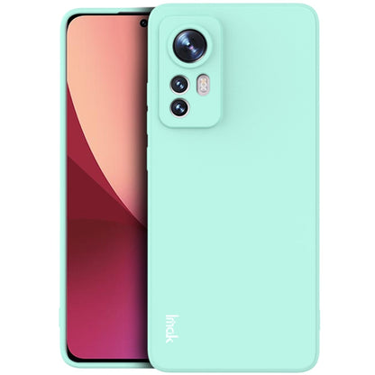 Light cyan TPU phone case with camera cutout and raised edge protection