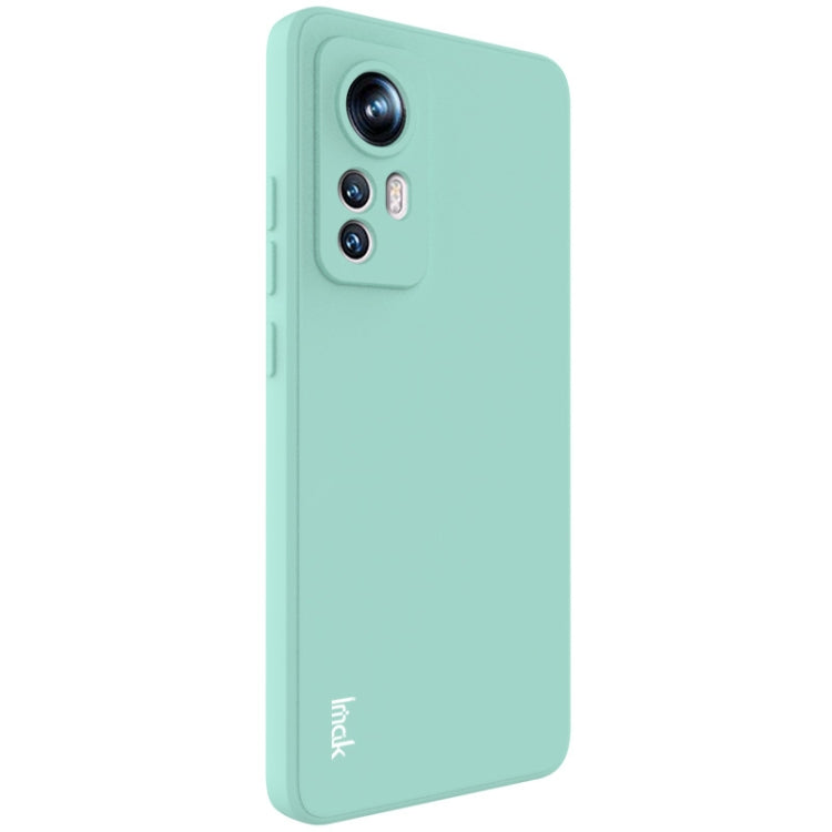 Light teal TPU phone case with camera cutout and slim matte back