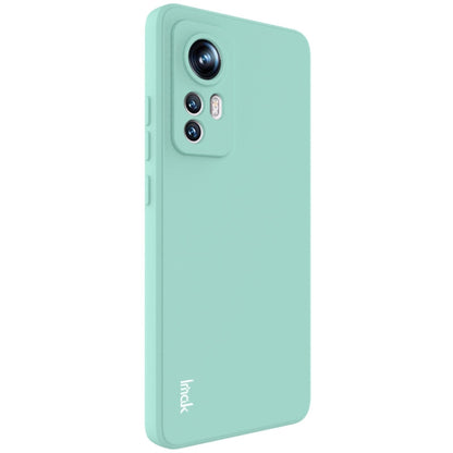 Light teal TPU phone case with camera cutout and slim matte back