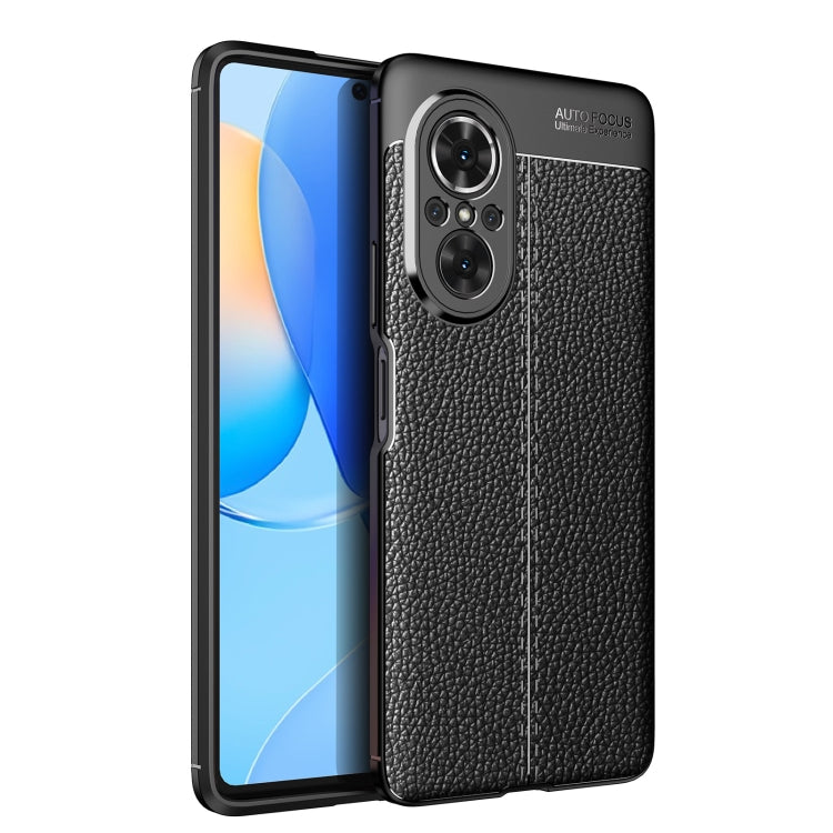 Shockproof TPU phone case with litchi texture, raised camera cover and side button cutouts, black
