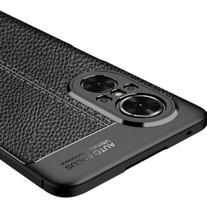 Close-up of black litchi-texture TPU case with dual camera lenses and precise port cutouts