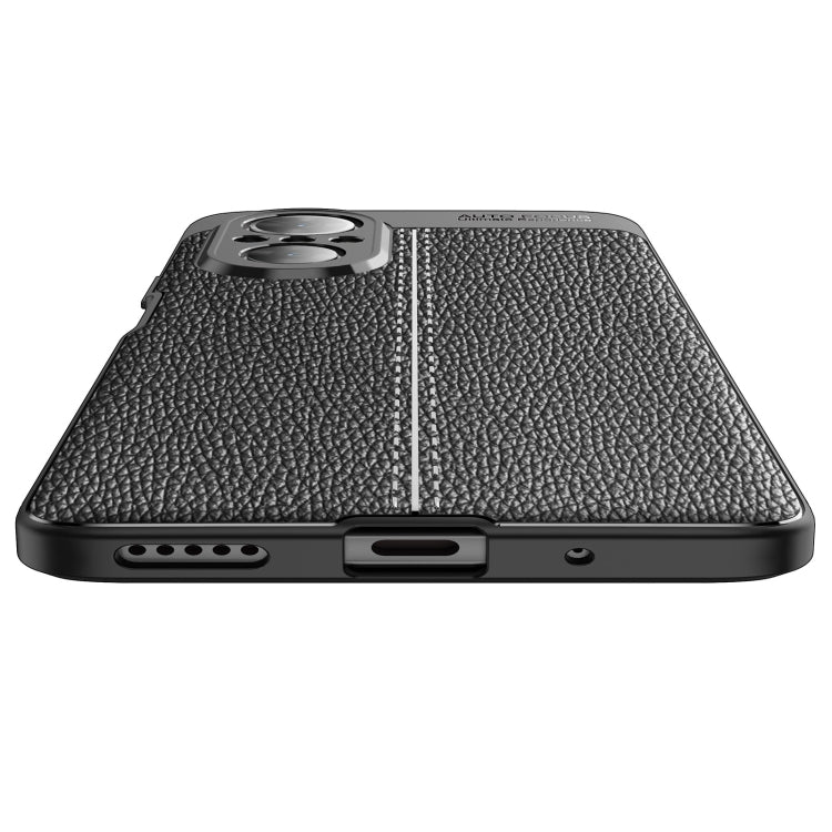 Black litchi-texture TPU phone case bottom with speaker and charging port openings